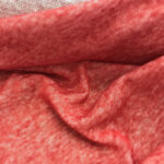 Pletenina červenobílý melír