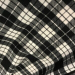 Plátno bílé s černou kostkou