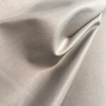 Gabardén s lesklou impregnací