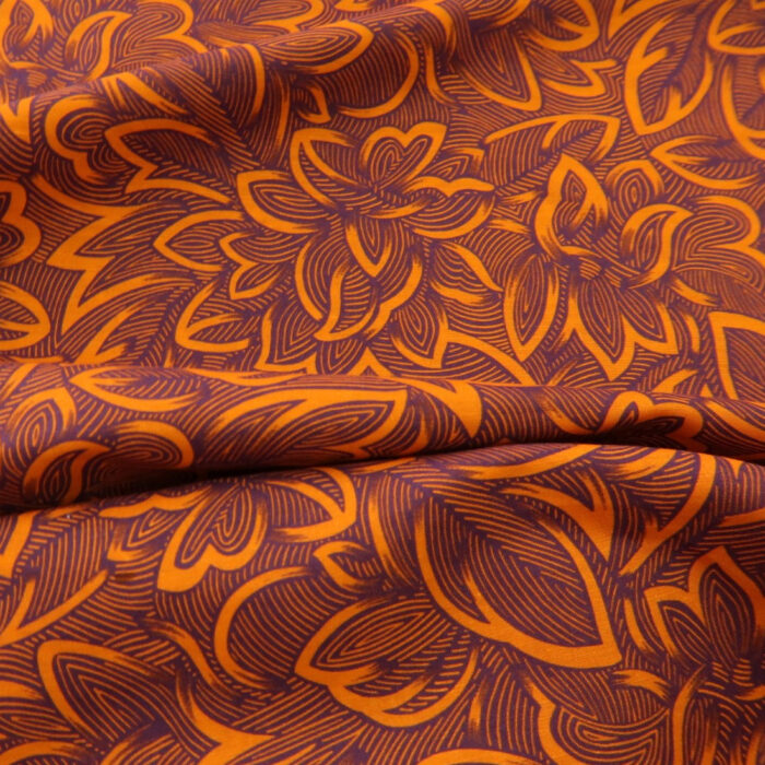 Plátno oranžové s lilkově fialovým vzorem lněné