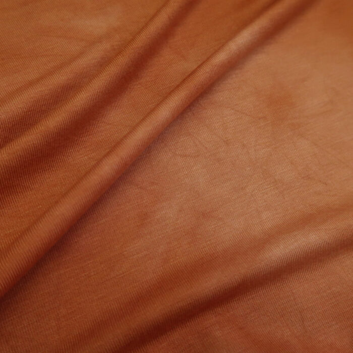 Úplet oranžový s batikou