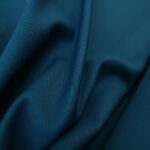 Vlněný serž petrolejový s viskózou