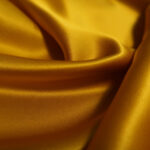 Satén žlutooranžový
