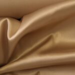 Satén zlatavě béžový