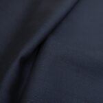 Kostýmovka tm. modrá žakárová