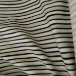 Gabardén smetanový s černými a šedobéžovými proužky