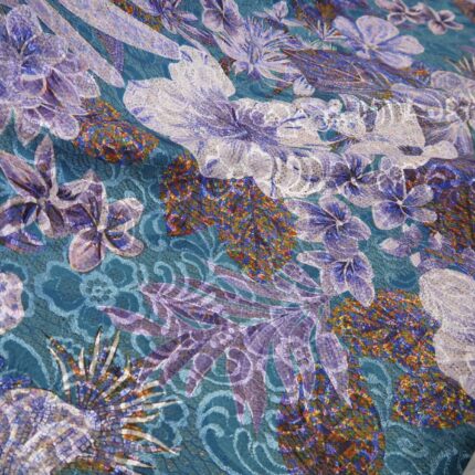 Pletenina s fialovo-tyrkysově květovanou krajkou
