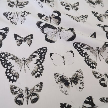Plátno smetanové s černými motýli