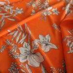 Batist oranžový s květy
