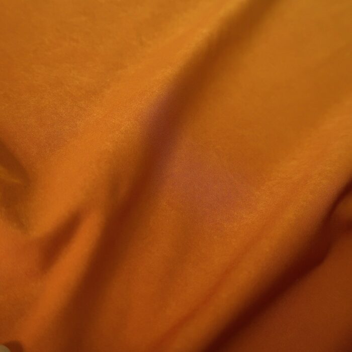 Plášťovka kari oranžová alá semiš