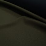 Plášťový serž khaki zelený podlepený vliselinem