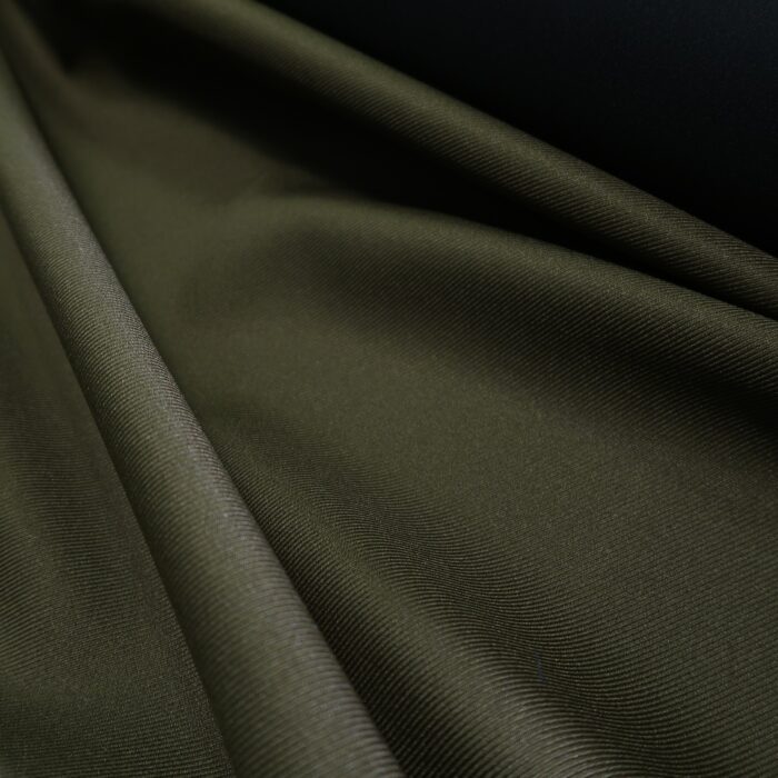 Plášťový serž khaki zelený podlepený vliselinem