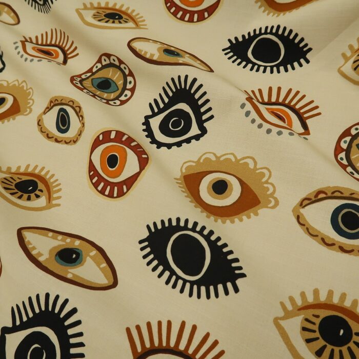 Plátno smetanové se vzory očí