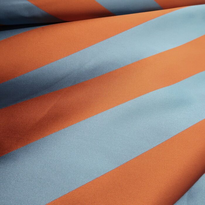 Žakár modro-oranžový s diagonálními pruhy