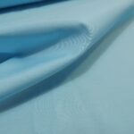 Plátno světle modré s jemným leskem