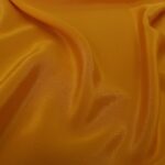 Krepdešín žluto-oranžový