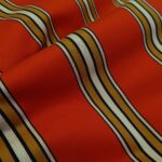 Gabardén oranžový s pruhy tuhý