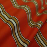 Gabardén oranžový s pruhy tuhý