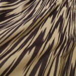 Úplet s lilkově fialovým a vanilkově žlutým žíháním