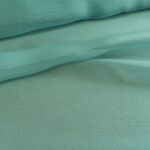 Šifon tyrkysový krešovaný