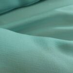 Šifon tyrkysový krešovaný
