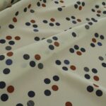 Krepdešín smetanový s puntíky