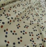 Krepdešín smetanový s puntíky