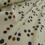 Krepdešín smetanový s puntíky