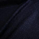 Batist modrý s hustou výšivkou