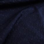 Batist modrý s hustou výšivkou