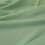 Kostýmovka mentolově zelená