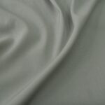 Vlněný serž světle šedý