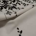 Úplet piké bílý s černými větvičkami