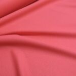 Vlněný serž lososově růžový