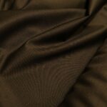 Vlněný serž hnědý