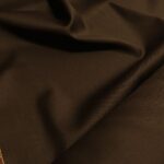 Vlněný serž hnědý