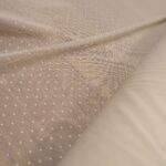 Tyl bílý pružný s puntíky