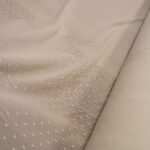 Tyl bílý pružný s puntíky