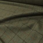 Kostýmovka modro-hnědo-zelená s oranžovým a hnědým rastrem