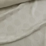 Krepsatén bílý žakárový s puntíky