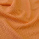 Krep žakárový oranžový hedvábný