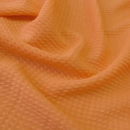Krep žakárový oranžový hedvábný