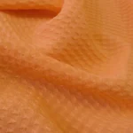 Krep žakárový oranžový hedvábný