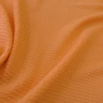 Krep žakárový oranžový hedvábný