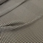 Krepdešín smetanový s drobnou černou kostkou