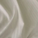 Gabardén bílý s plastickými proužky
