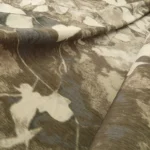 Plášťovka s šedobílým vzorem taftová